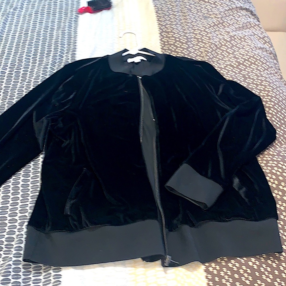 Lush black velour light jacket that pairs well with jeans or slacks